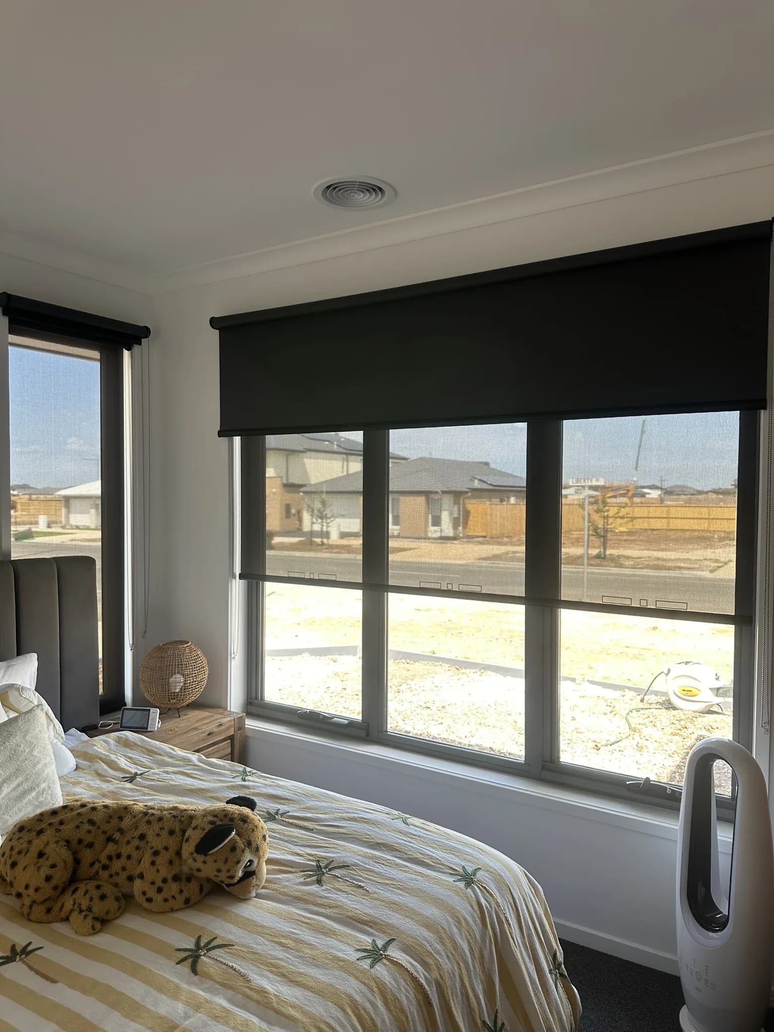 Double blockout rollers gave each room flexible light control, daytime privacy and full night-time coverage, while the black finish added a sleek, modern look against the home's clean interior palette. Frosted window film was also installed to the front door and bathroom windows.