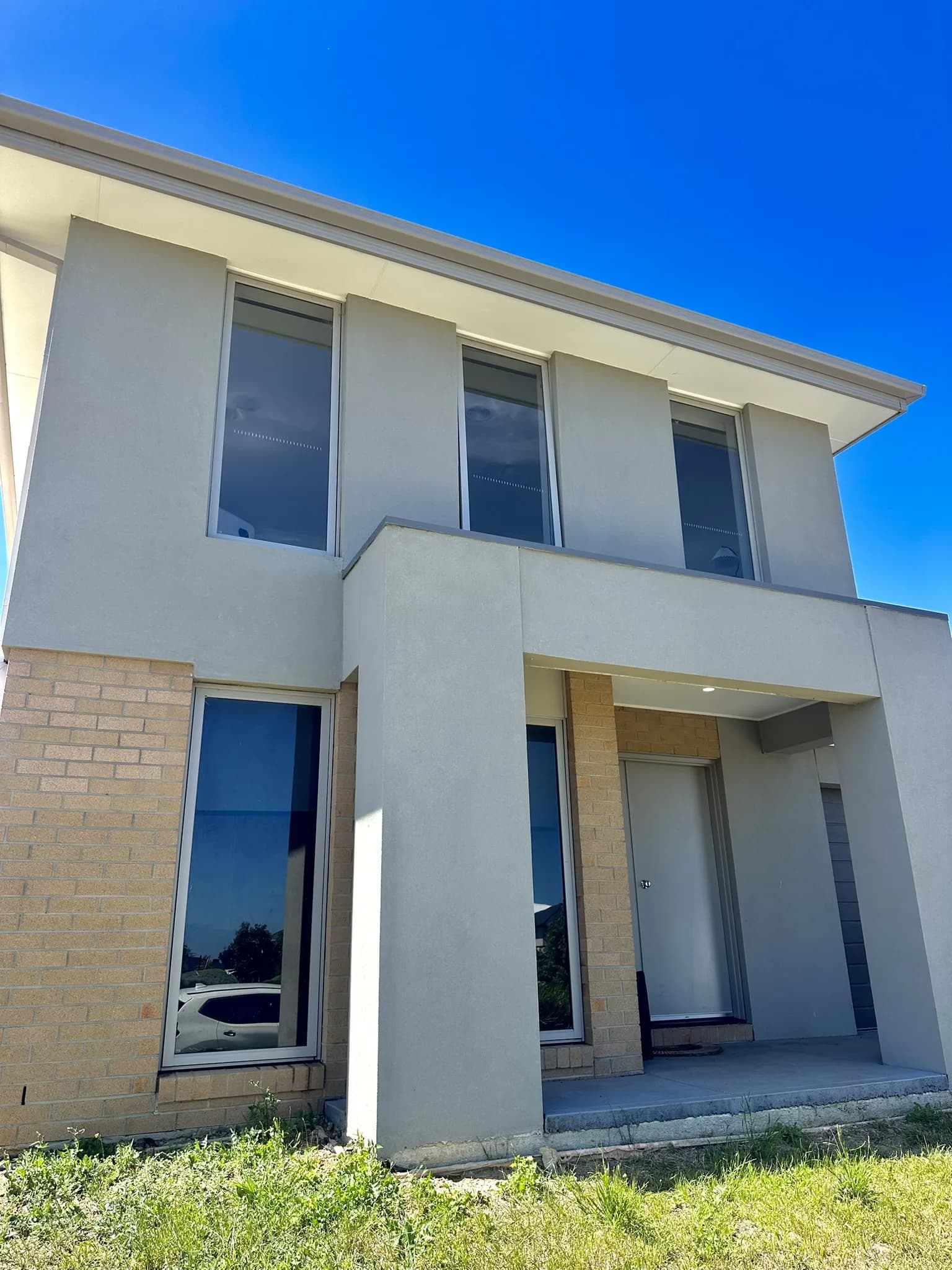 30% window tint installed throughout a double-storey home to reduce heat, soften glare and add daytime privacy while maintaining a clean, modern finish.