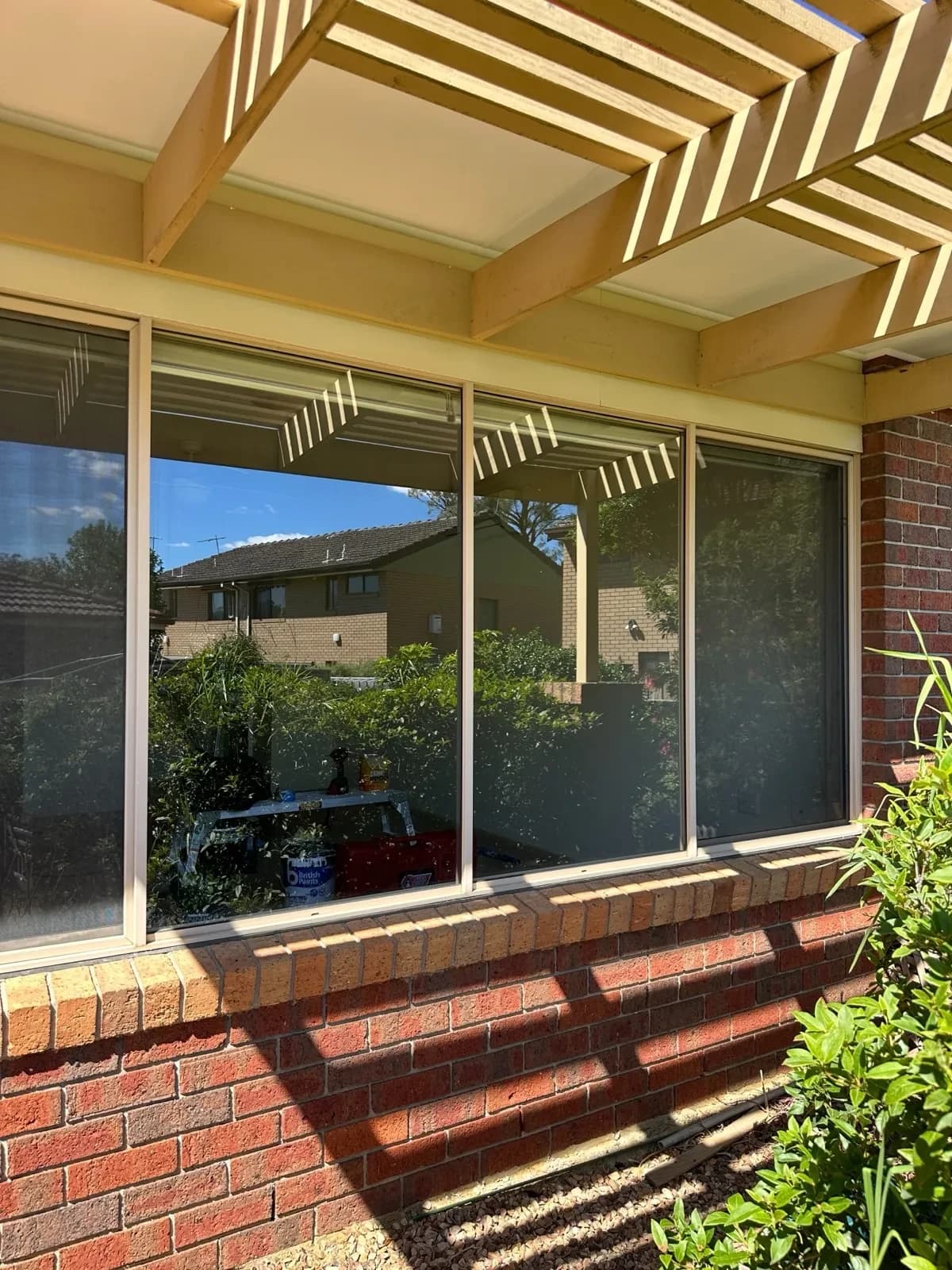 Heritage brick home with freshly tinted windows in Melbourne